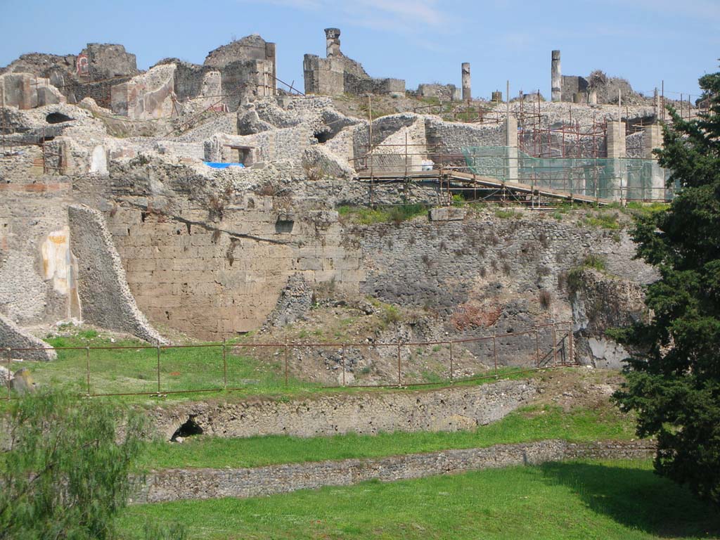 Walls on west side of Pompeii. May 2010. Looking east towards City Walls below VII.16.16/15. Photo courtesy of Ivo van der Graaff.