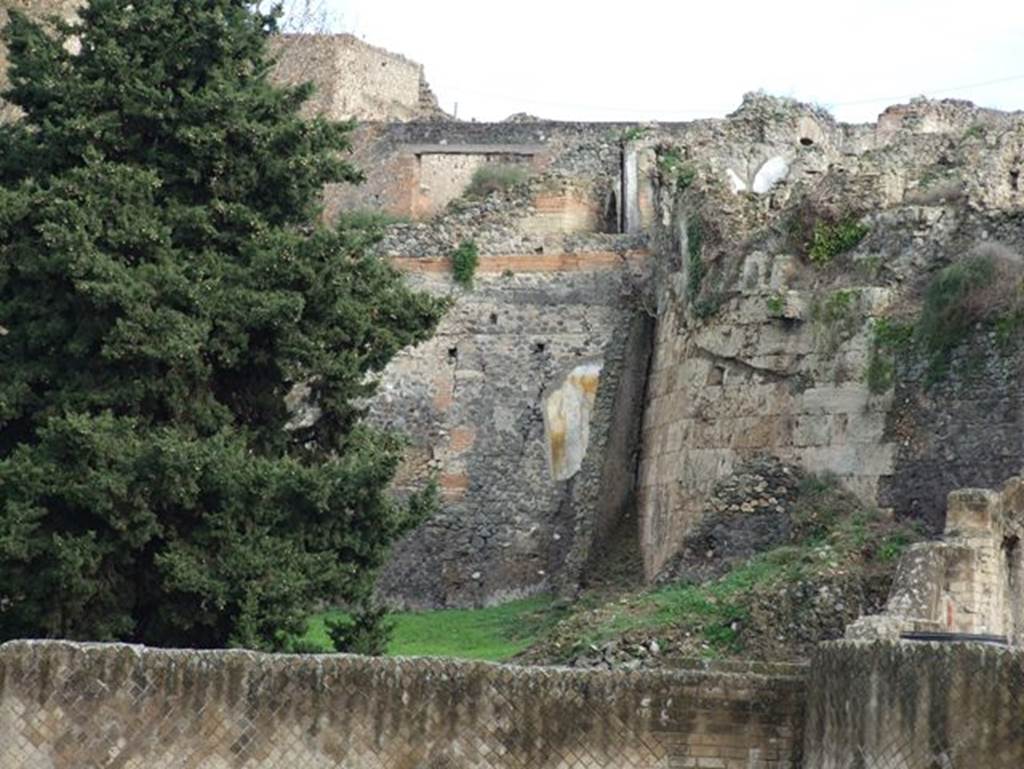 Unnumbered area at rear of VII.16.16 and VII.16.15. December 2006. This shows the house was built over the city walls which were no longer needed.  This part of Pompeii was the location of several houses of wealthy people.  Like the House of Umbricius Scaurus, a number of the houses here had several floor levels and views of the sea.
