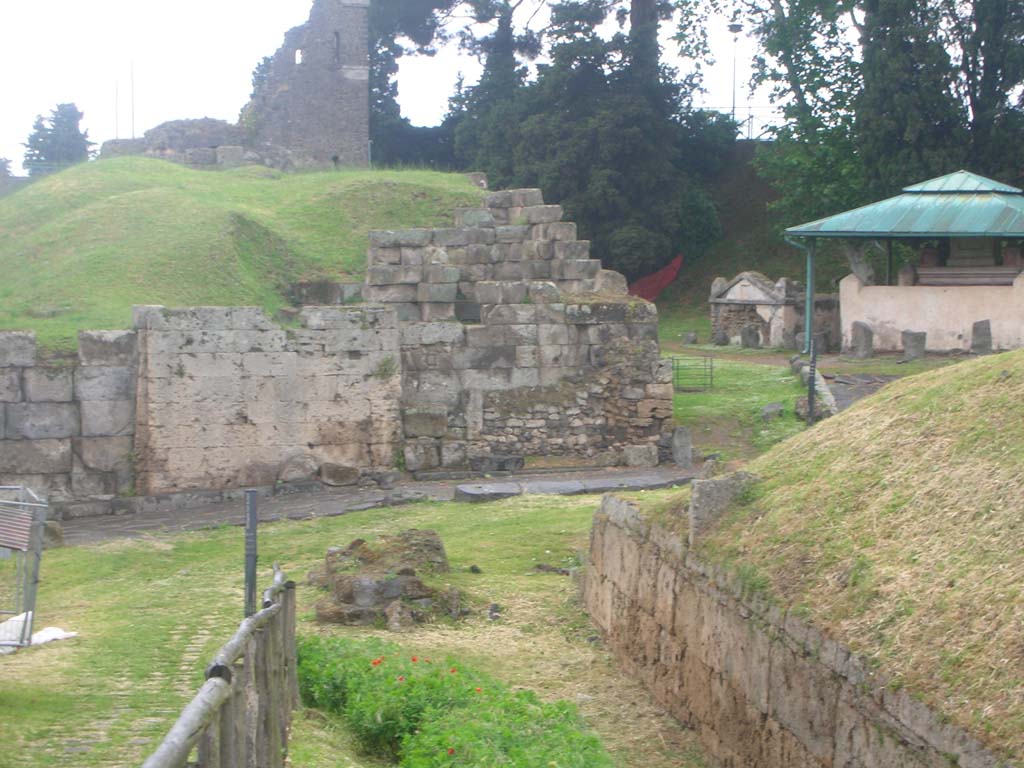 City Wall and Vesuvian Gate, Pompeii. May 2010. 
Looking towards west side of Gate at north end, with remains of high City Wall, in centre. Photo courtesy of Ivo van der Graaff.
