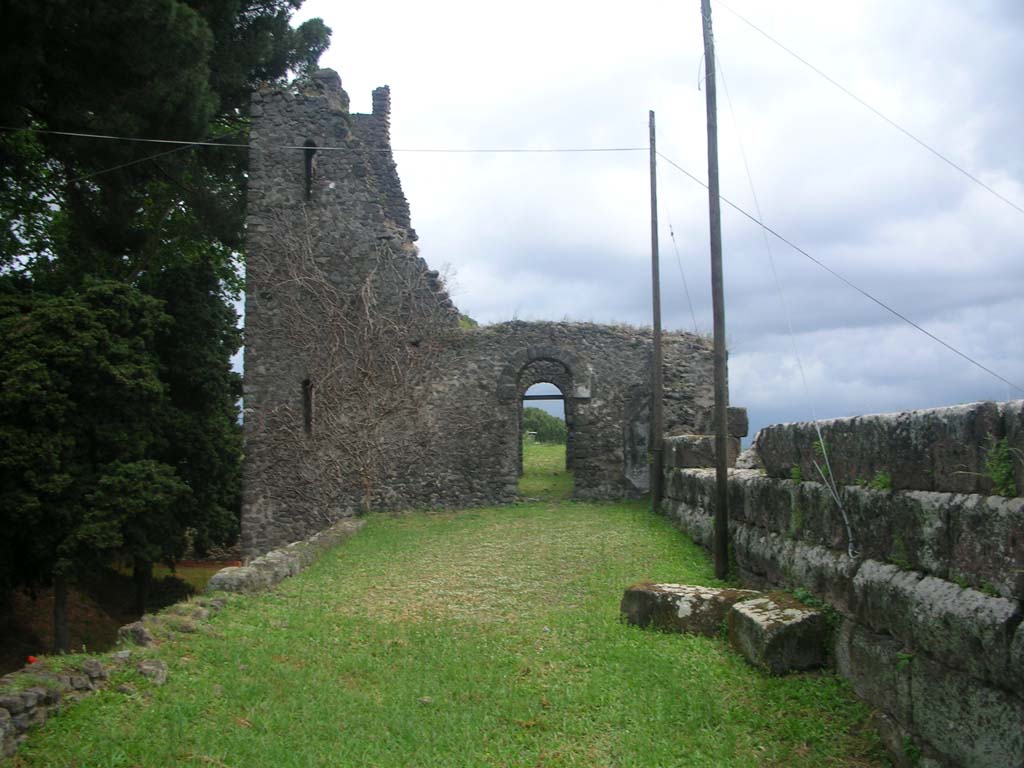 Tower X, Pompeii. May 2010. Looking east towards doorway on west side of Tower. Photo courtesy of Ivo van der Graaff.

