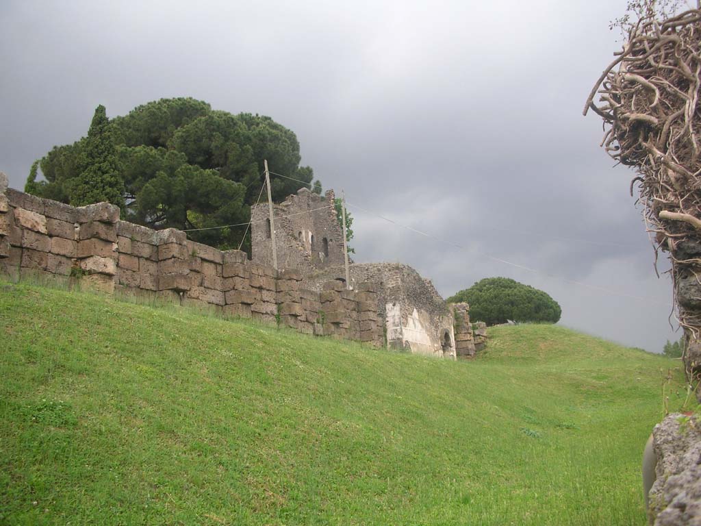 Tower X, Pompeii. May 2010. Looking east along interior City Walls towards Tower. Photo courtesy of Ivo van der Graaff.